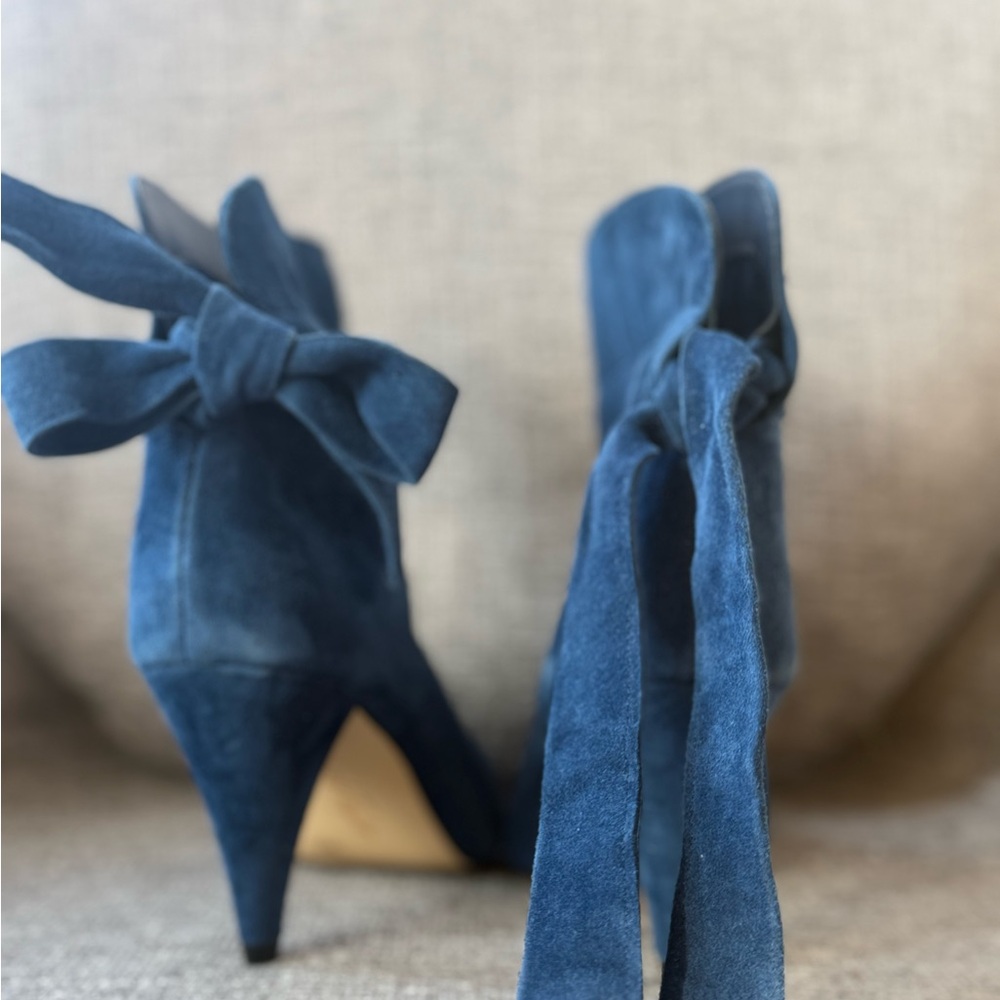 Elegant & a fun Blue Suede Women's Booties with a bow detail in the back